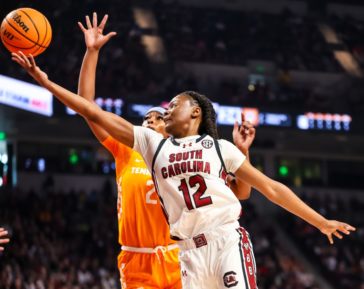 Mar 3, 2024; Columbia, South Carolina, USA; South Carolina Gamecocks guard MiLaysia Fulwiley (12) drives past Tennessee Lady Vols center Tamari Key (20) in the first half at Colonial Life Arena. 
